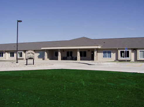 CedarVillage-Enhanced-SR Close-up of hands of people sitting in a circle during a therapy