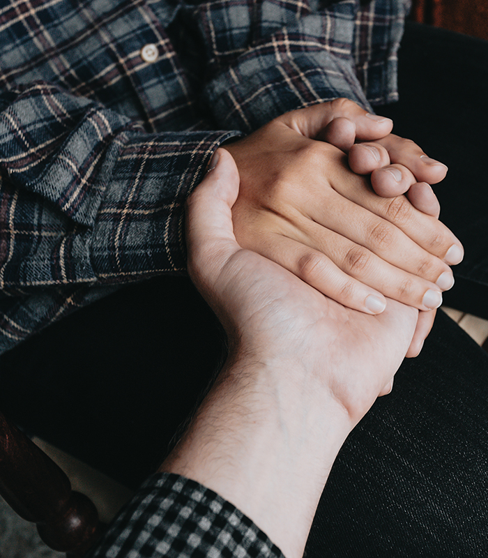 People holding hands, self help and depression concept, minimal